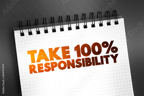 Take 100 Percent Responsibility text on notepad, concept background