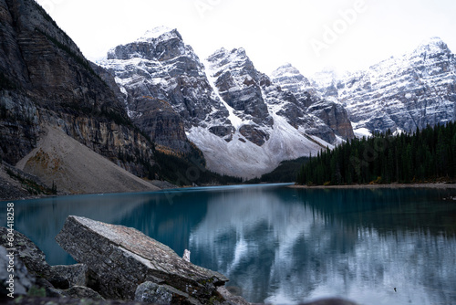 Picturesque glacial lake framed by rocky mountains with turquoise coloured water. Banff National Park. Alberta, Canada.
