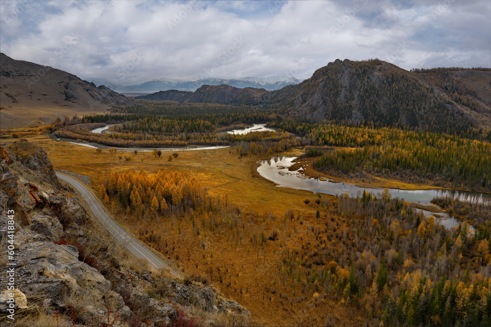 Russia. The South of Western Siberia, the Altai Mountains. Amazing autumn view of the bends of the Chuya River near the North Chuya mountain range, popularly named as the Chuya snail.
