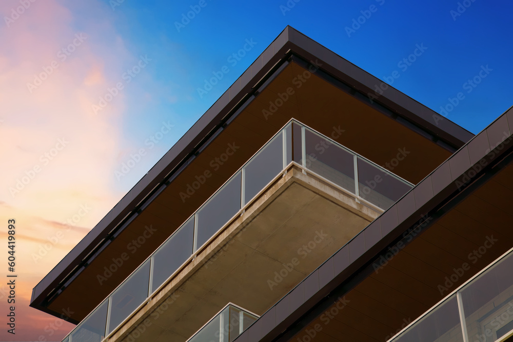 building with balcony corner on dramatic sky clouds sunset minimalist architecture building with balcony corner on dramatic sky clouds sunset minimalist architecture