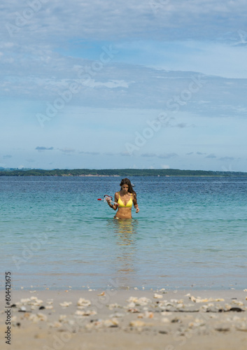 Sexy body blonde woman on paradise wild tropical beach. Travel vacation © Nestor