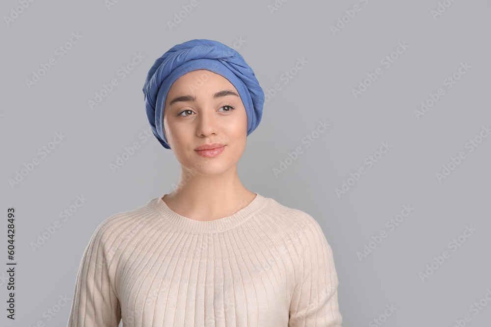 Beautiful woman with cancer on grey background. Space for text Beautiful woman with cancer on grey background. Space for text