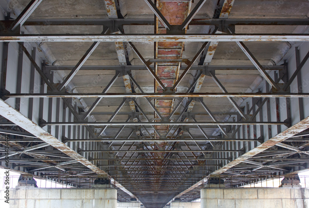 Reinforced concrete bridge from below. Reinforced concrete bridge construction. Infrastructure, bridge engineering. Reinforced concrete bridge from below. Reinforced concrete bridge construction. Infrastructure, bridge engineering.