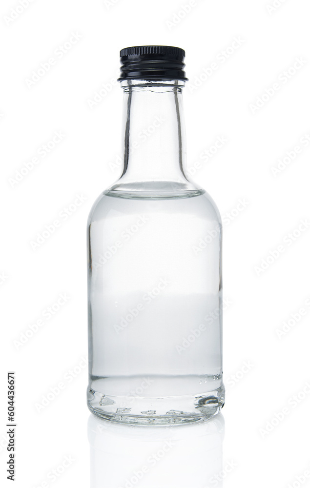 Glass bottle soda water close up on a white background Glass bottle soda water close up on a white background