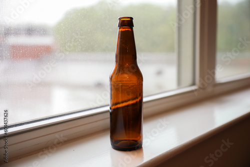 beer bottle with an empty label evokes memories, camaraderie, and the anticipation of new experiences