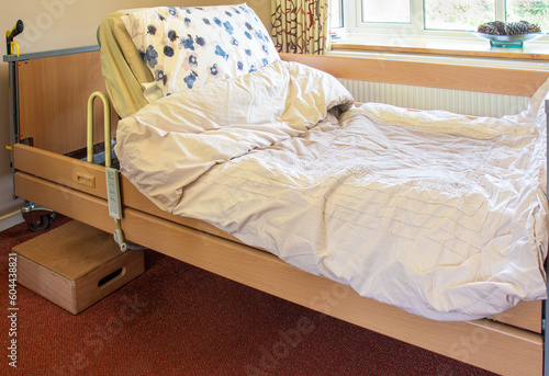 Bed situated downstairs for a disabled person