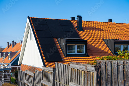 Solar cells on a house roof.