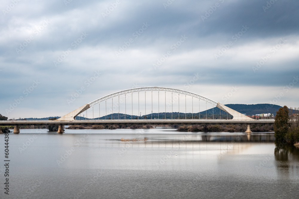 Wide-angle view of the modern Lusitania bridge over the Guadiana River in Merida, Spain.