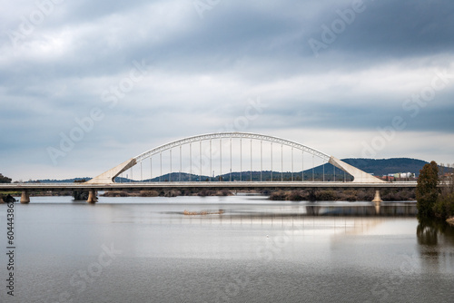 Wide-angle view of the modern Lusitania bridge over the Guadiana River in Merida, Spain.