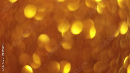 gold sparkling background bokeh. Elegant gold background with glitter sparkle bokeh
