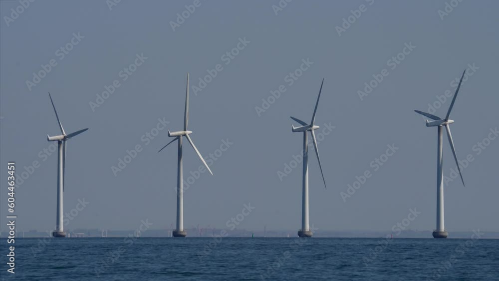 Windmills near Copenhagen harbour in sunny day. Windmills near Copenhagen harbour in sunny day.