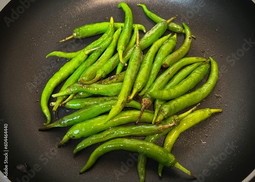 green chilis in a frying pan