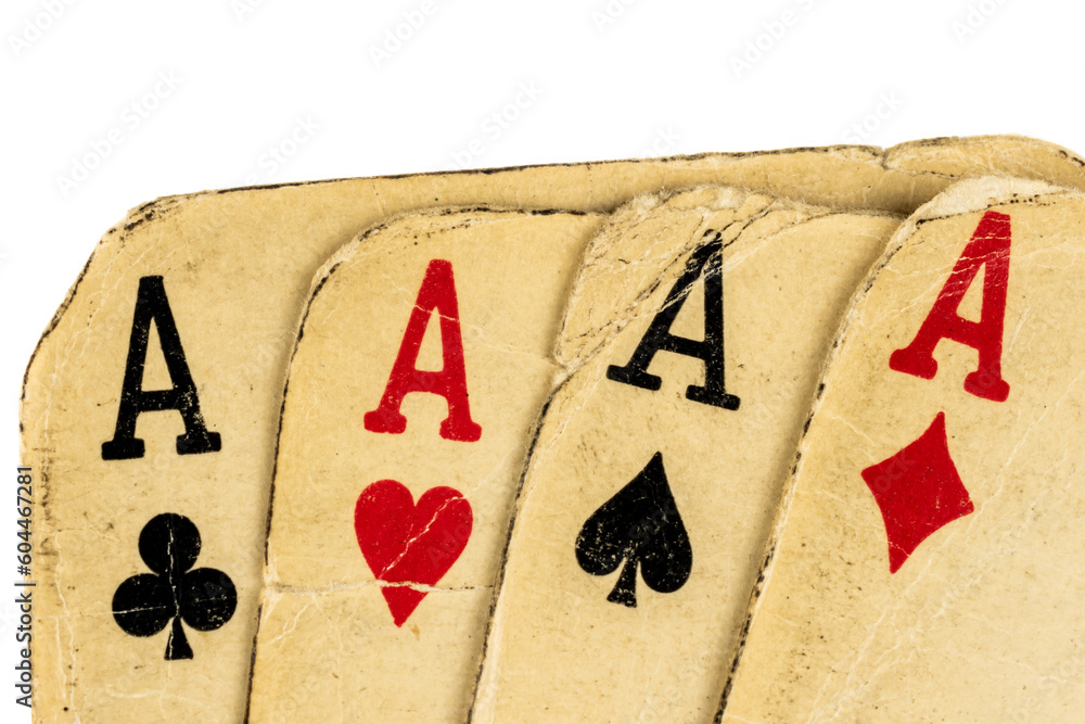 Four old dirty aces poker cards on a transparent isolated background. png