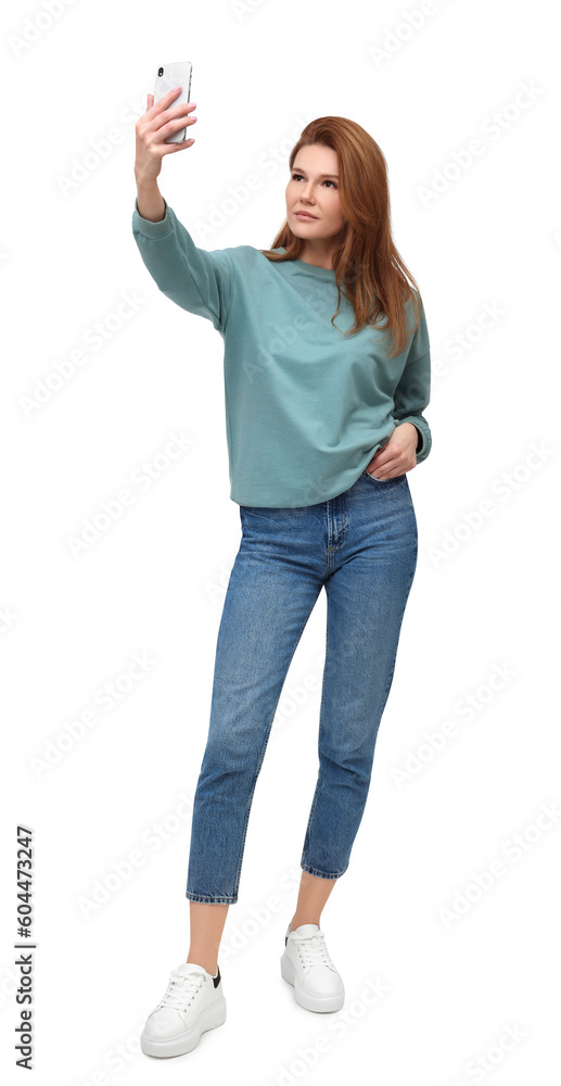 Beautiful woman taking selfie on white background Beautiful woman taking selfie on white background