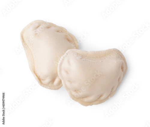 Raw dumplings (varenyky) with tasty filling on white background, top view