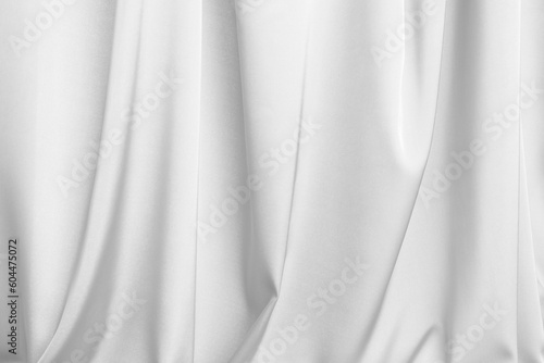 White silk fabric as background, closeup view