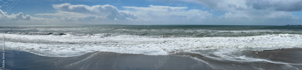 Ocean Beach in Aptos California Panoramic Banner with Waves Sand and Clouds in a Blue Sky