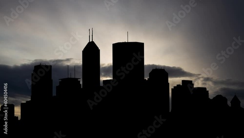 Skyline of Indianapolis, Time Lapse at Sunrise with Fast Clouds and Dark Silhouette of Skyscrapers,  Indiana