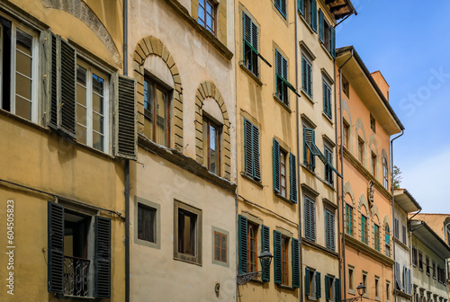 Gothic buildings on a narrow street in Centro Storico of Florence, Italy