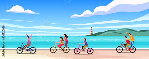 Groups of children ride bicycles on the beach having fun in summer time vacation.