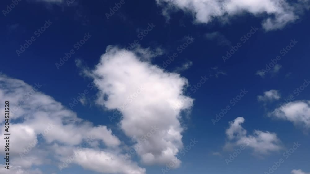 Fluffy white clouds flowing in the blue sky. Cumulus cloud. Cloudscape Fluffy white clouds flowing in the blue sky. Cumulus cloud. Cloudscape