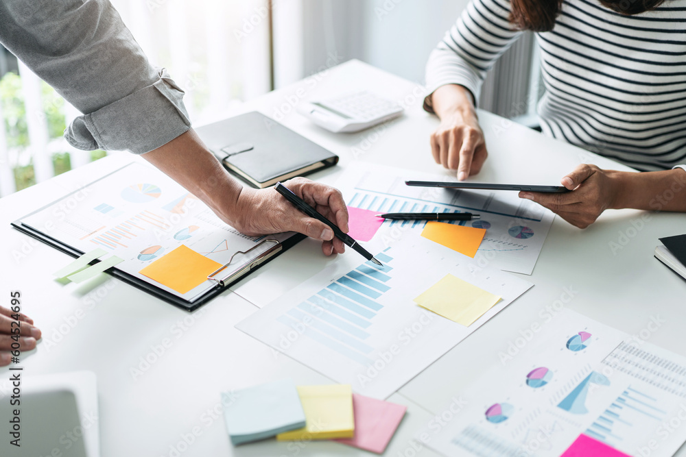 Business team colleagues consultation and discussion marketing p Business team colleagues consultation and discussion marketing p