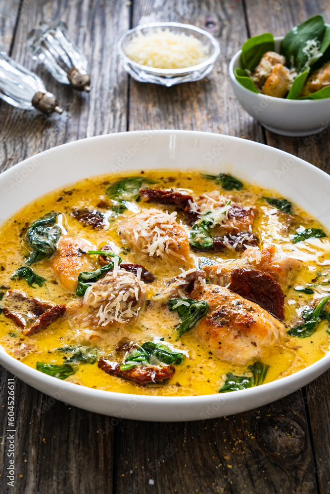 Creamy Tuscan chicken with parmesan, spinach and sun dried tomatoes. Creamy Tuscan chicken with parmesan, spinach and sun dried tomatoes.