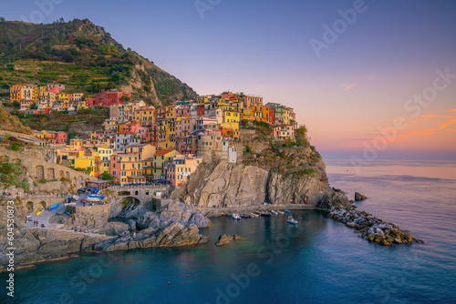 Fototapeta Naklejka Na Ścianę i Meble -  Colorful cityscape of buildings over Mediterranean sea, Europe, Cinque Terre in Italy