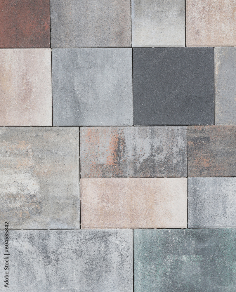 Artificial stone wall with uneven stones colors and shades. Modern architecture concept idea Artificial stone wall with uneven stones colors and shades. Modern architecture concept idea