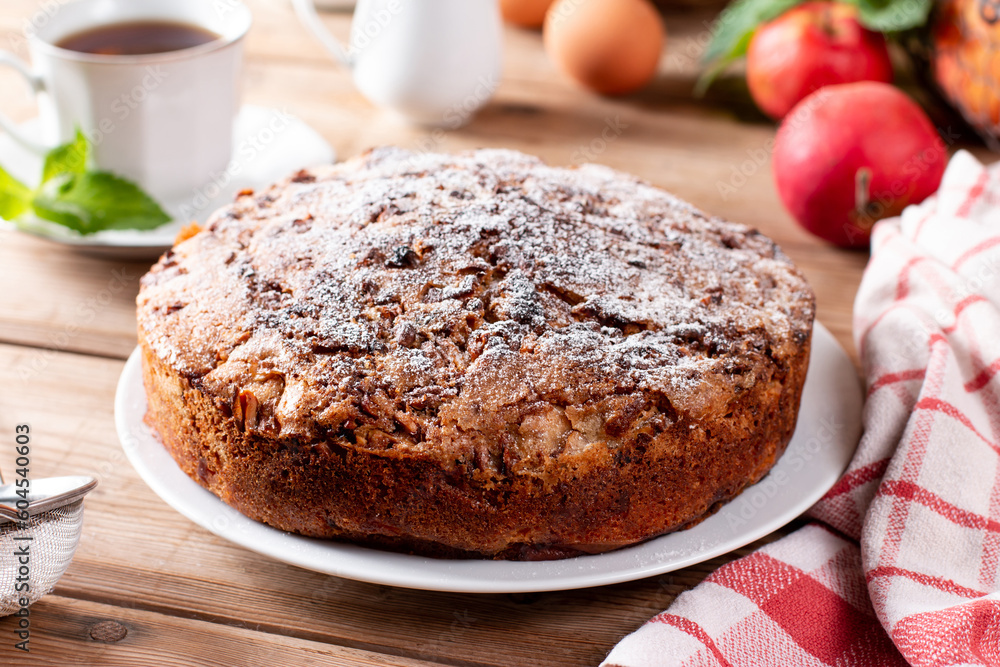 Fresh sponge cake with apples. Chiffon biscuit on table