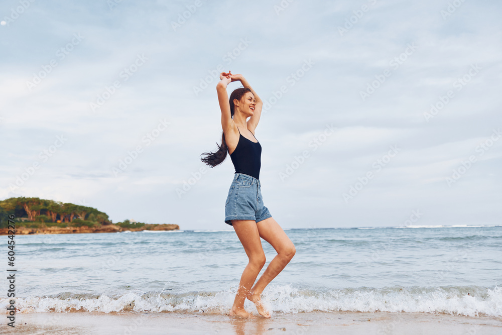 running woman travel sunset summer sea freedom lifestyle beach young smile running woman travel sunset summer sea freedom lifestyle beach young smile