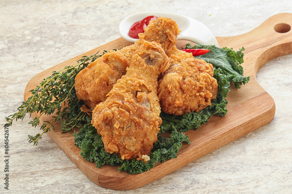 Fried chicken drumsticks with tomato sauce Fried chicken drumsticks with tomato sauce