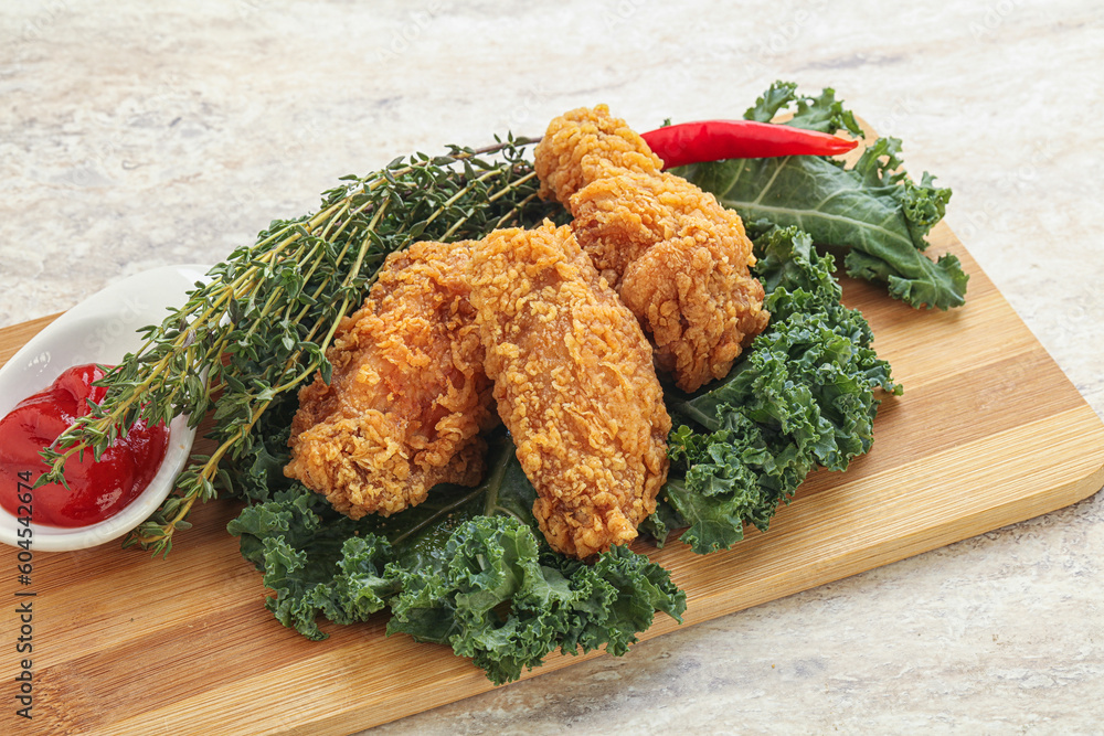 Crispy chicken wings with tomato ketchup