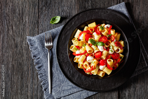 pepper tomato mozzarella pasta salad in bowl