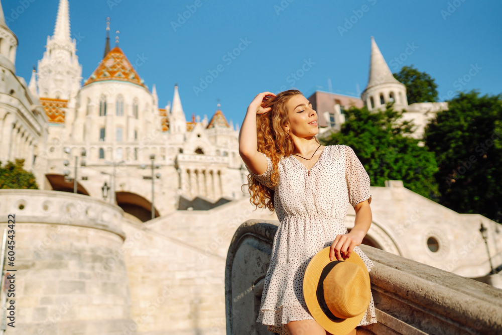 Young female tourist walks around the city.  Euro-trip. Travel, tourism and active lifestyle concept.