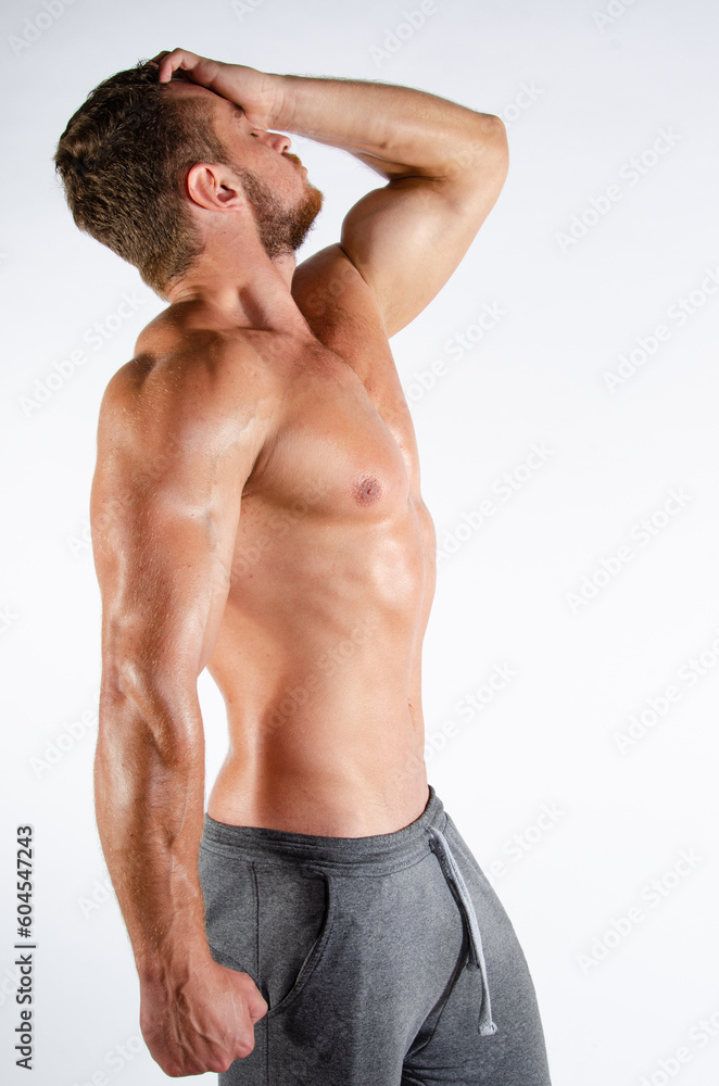 Poor health. Men's problems. Attractive man posing in the studio. Poor health. Men's problems. Attractive man posing in the studio.