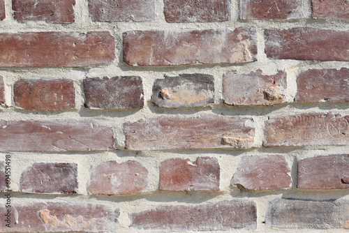 Fond texture mur en briques anciennes avec joints à la chaux et au sable