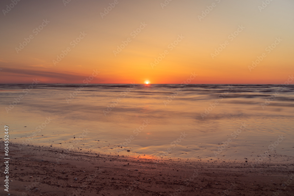 Sunset on Baltic sea shore