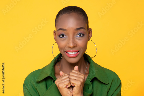 Fotografija Headshot portrait of fashionable skinhead African American woman face with big e