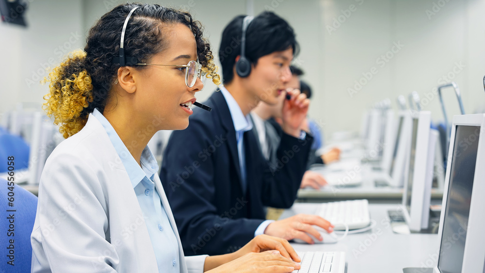 Fototapeta premium Multinational operator group working in the office. Call center. Customer support staff.