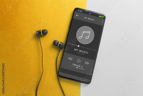 Music player in phone, wireless headphones and phone photo