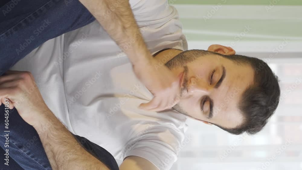 Vertical Video of Portrait of depressed young man who is depressed. Vertical Video of Portrait of depressed young man who is depressed.