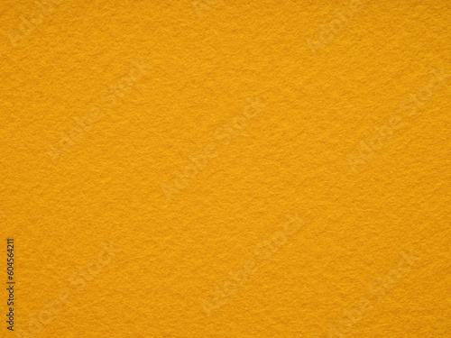 Bright orange matt felt material blank. Surface of felted fabric texture background. High resolution photo. Pattern for text, lettering, 3d, patchworkor other art work.