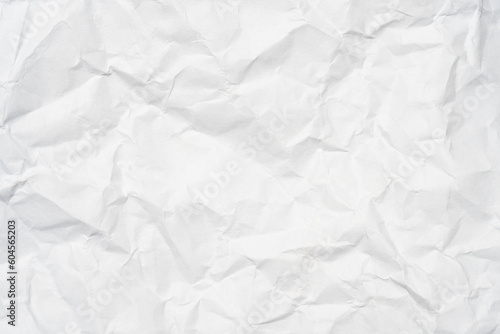 Closeup of white crumpled paper for texture background.
