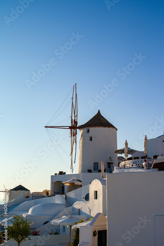 The highest windmill and houses of the Oia village Santorini Greece