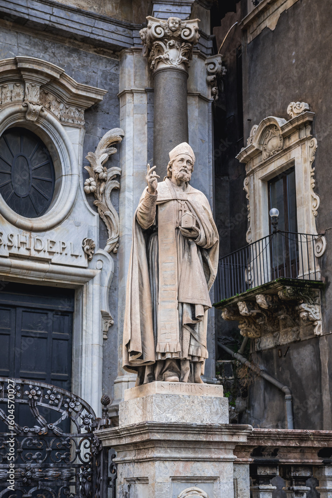 Statue in front of Cathedral of Saint Agatha in historic part of Catania, Sicily Island in Italy