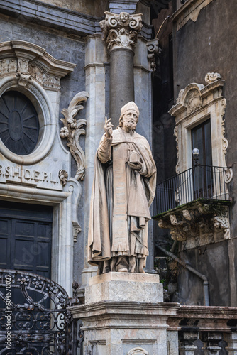 Statue in front of Cathedral of Saint Agatha in historic part of Catania, Sicily Island in Italy
