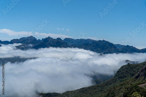 Mountain range and peaks covered in clouds, fog and mist on Madeira Island , Portugal