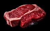 Raw beef steak with salt on a black background generative ai