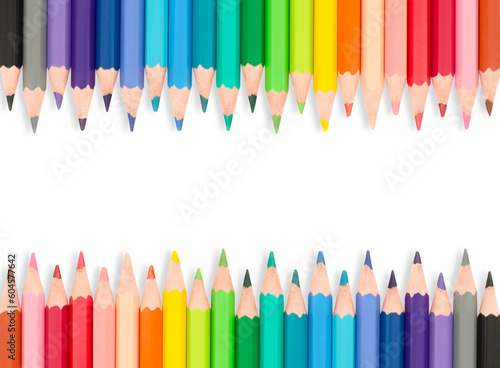 Isolated set of rainbow color wooden pencils. Multicolored bright background for your text. Frame